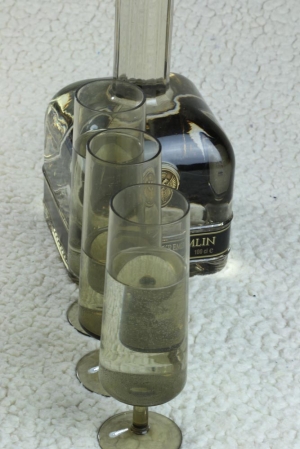 Still life with a bottle and glasses  